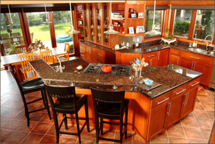 Inspiration for a large transitional l-shaped open concept kitchen remodel with an undermount sink, medium tone wood cabinets, granite countertops, an island, shaker cabinets, multicolored backsplash, stone slab backsplash and stainless steel appliances