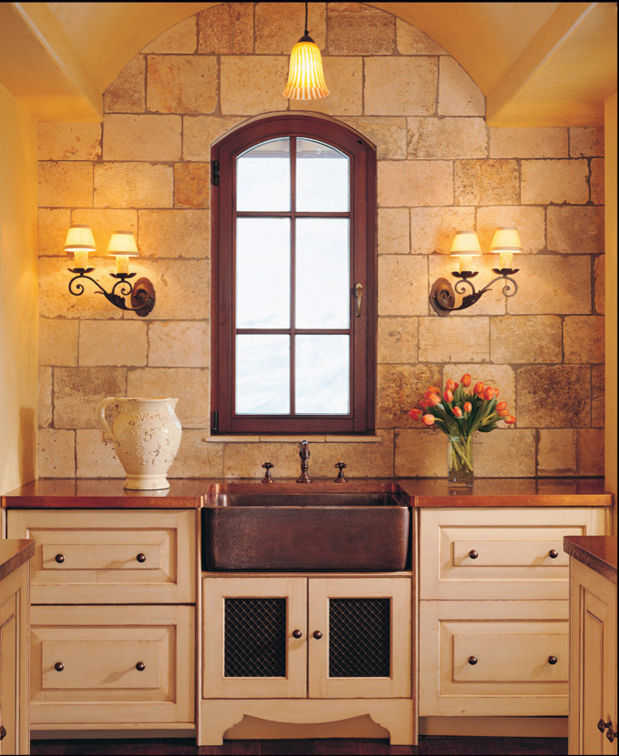 This is an example of a mediterranean laundry room in Denver.