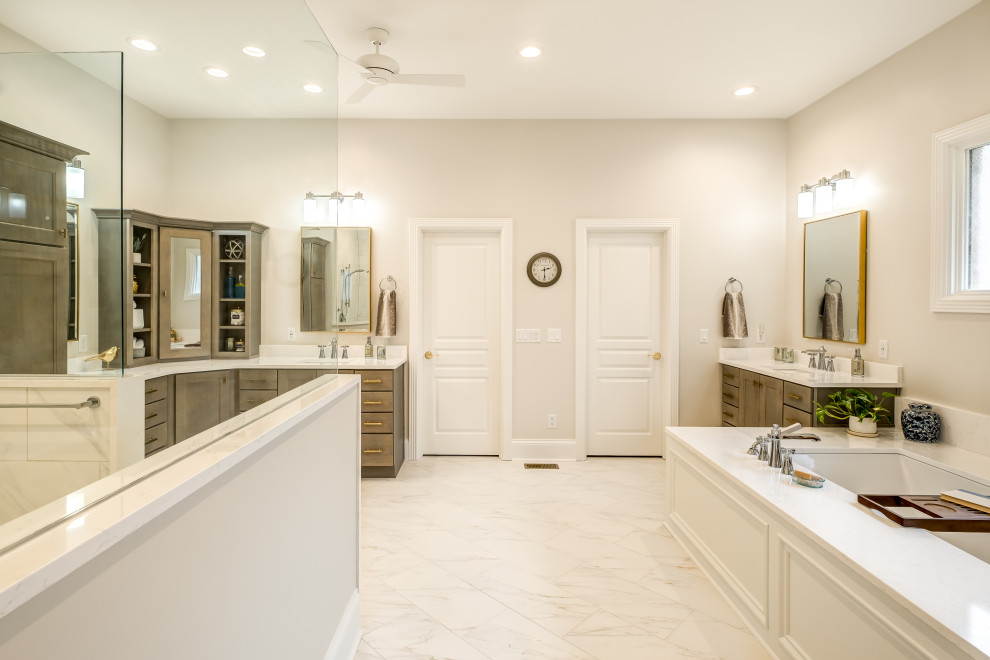 Example of a large transitional master white tile and porcelain tile ceramic tile, white floor and double-sink bathroom design in Other with shaker cabinets, medium tone wood cabinets, a bidet, beige walls, an undermount sink, quartz countertops, white countertops and a built-in vanity
