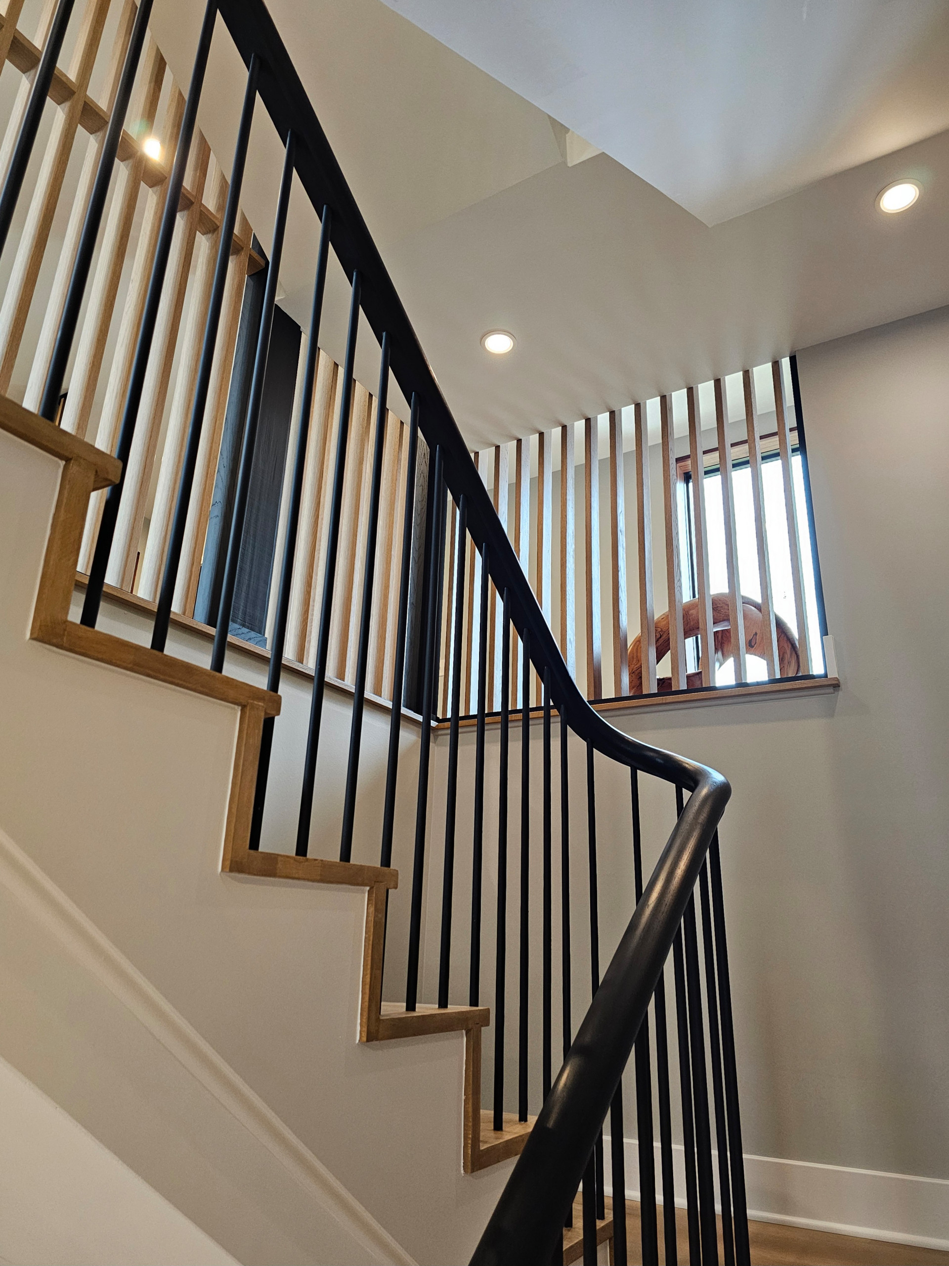 115_Stunning Continuous Rail System on 3 Story Floating Stairs; Arlington, VA 22