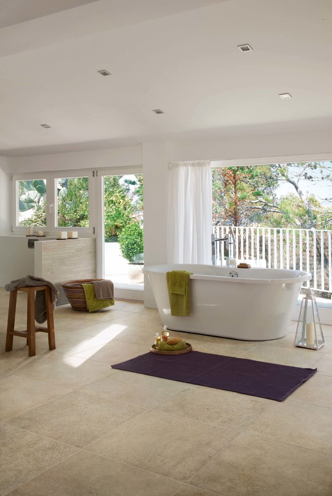 Design ideas for a modern bathroom in Sydney with beige tile, porcelain tile and porcelain floors.