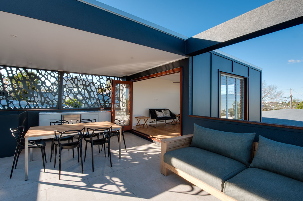 This is an example of a mid-sized contemporary rooftop deck in Brisbane.