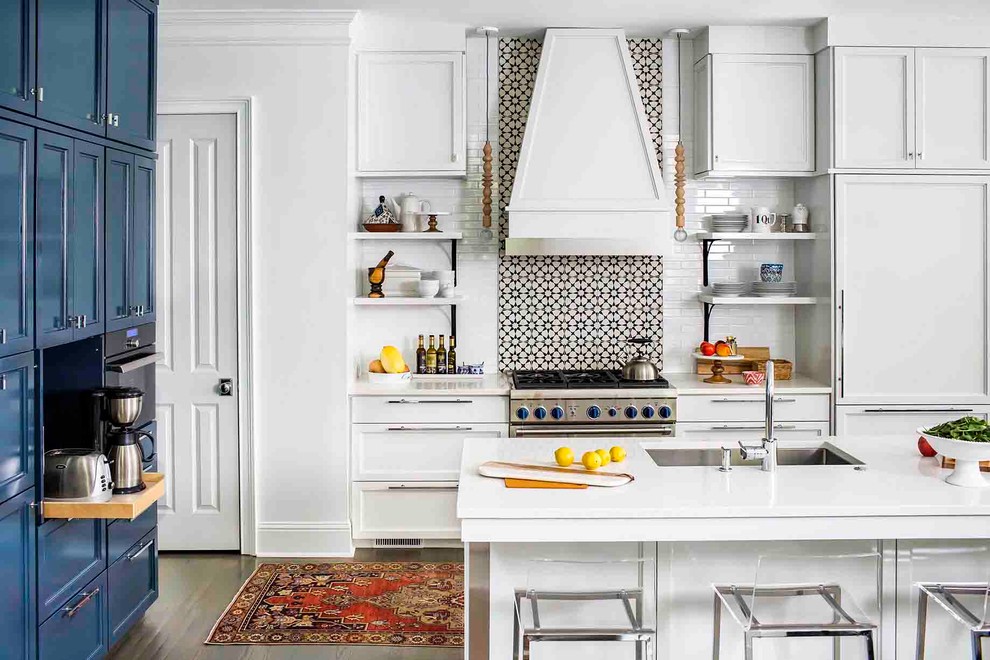 Design ideas for a transitional kitchen in Atlanta with an undermount sink, shaker cabinets, white cabinets, multi-coloured splashback, cement tile splashback, stainless steel appliances, dark hardwood floors and with island.