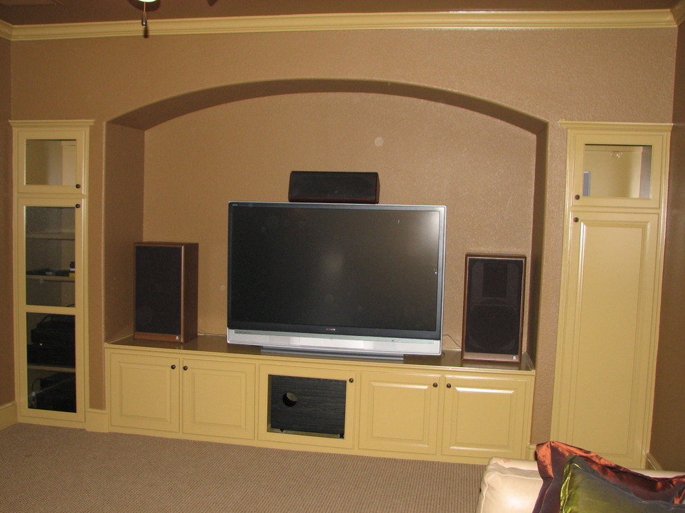 This is an example of a mediterranean home theatre in Dallas.