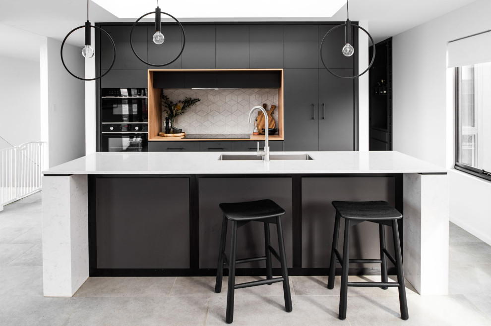 Design ideas for a modern kitchen in Hobart with with island.