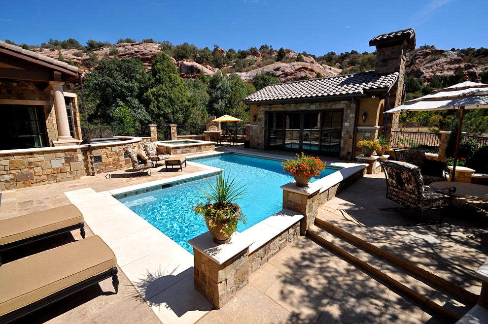 Design ideas for a mid-sized mediterranean backyard l-shaped natural pool in Denver with a hot tub and tile.