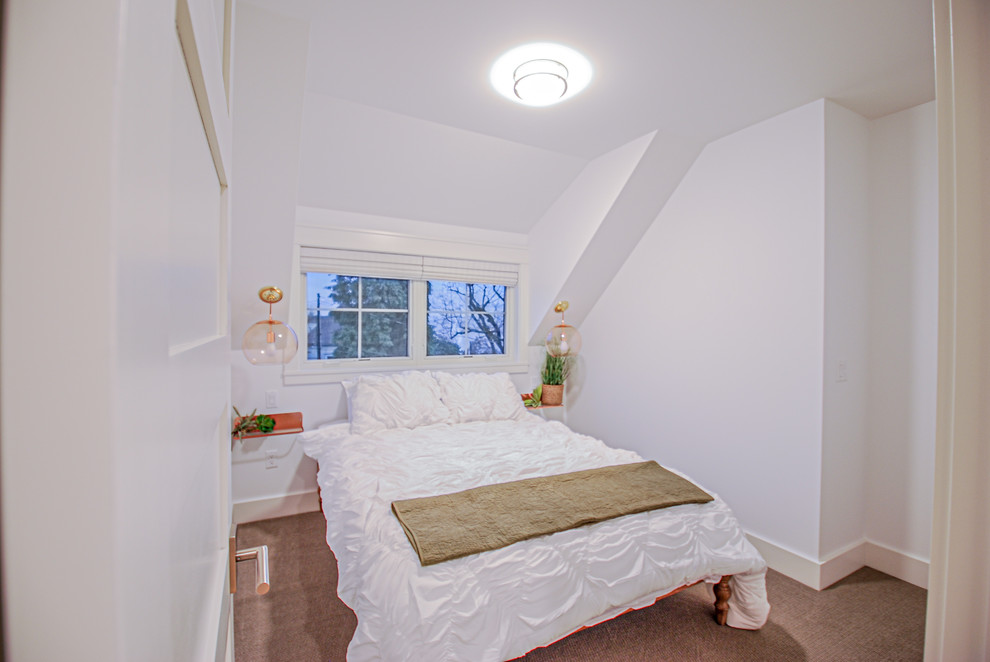 Large traditional guest bedroom in Portland with white walls, carpet and grey floor.