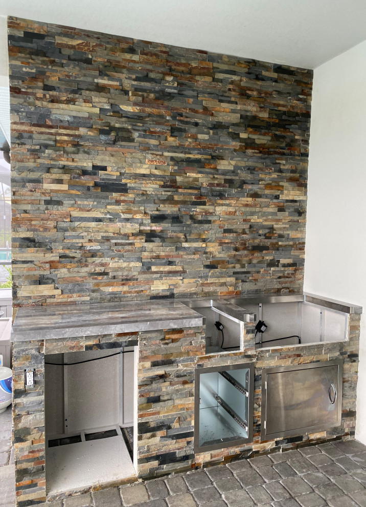 Mountain style home design photo in Miami