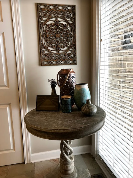 Small transitional slate floor and beige floor hallway photo with beige walls