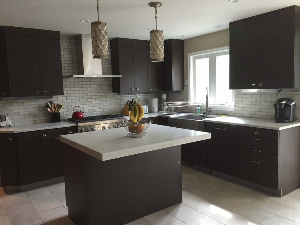 Kitchen - mid-sized transitional u-shaped ceramic tile and beige floor kitchen idea in Chicago with a farmhouse sink, flat-panel cabinets, medium tone wood cabinets, solid surface countertops, white backsplash, ceramic backsplash, stainless steel appliances and an island