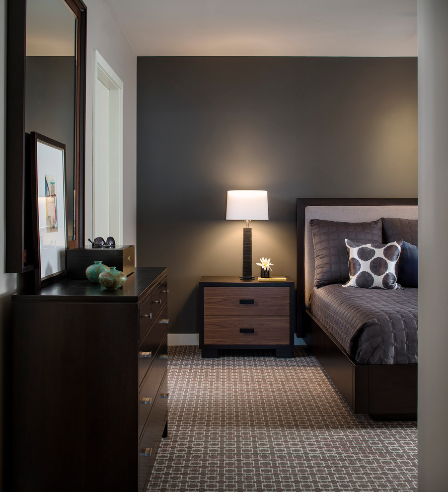 This is an example of a mid-sized transitional master bedroom in Chicago with grey walls, carpet and no fireplace.