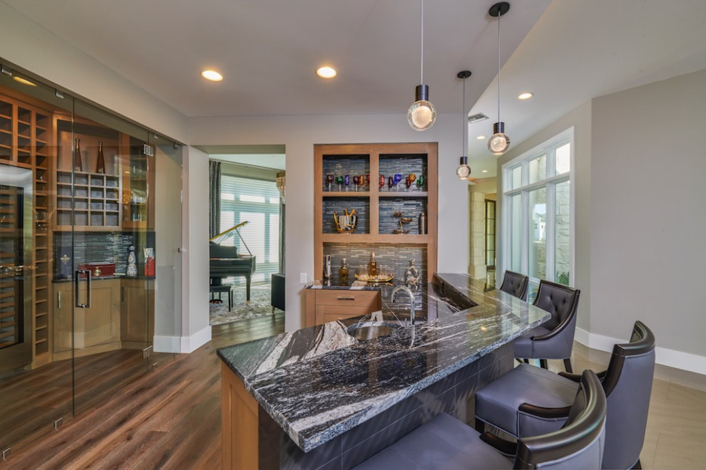Home bar - transitional home bar idea in Austin