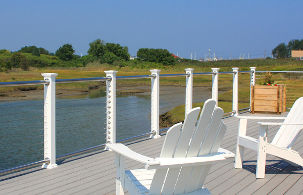 Design ideas for a beach style deck in Wilmington.