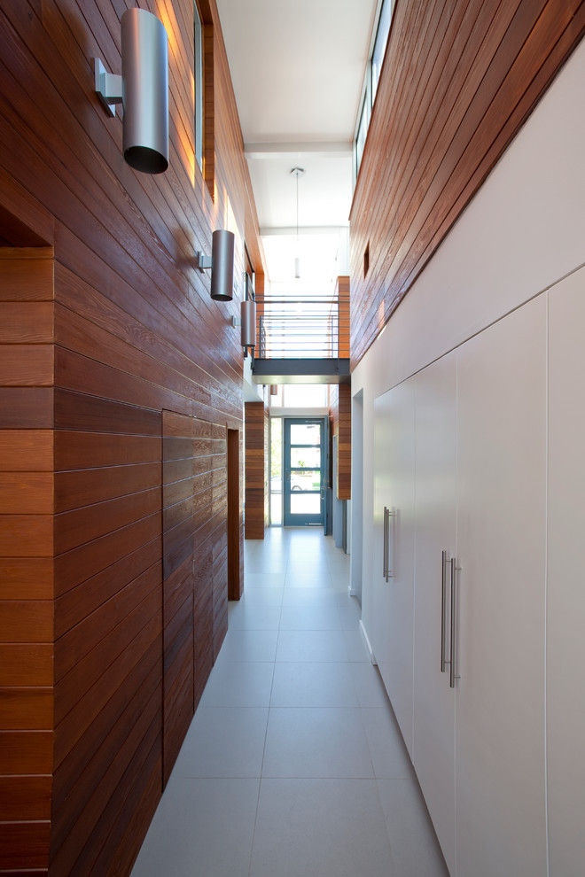 Contemporary hallway in New York with white walls.