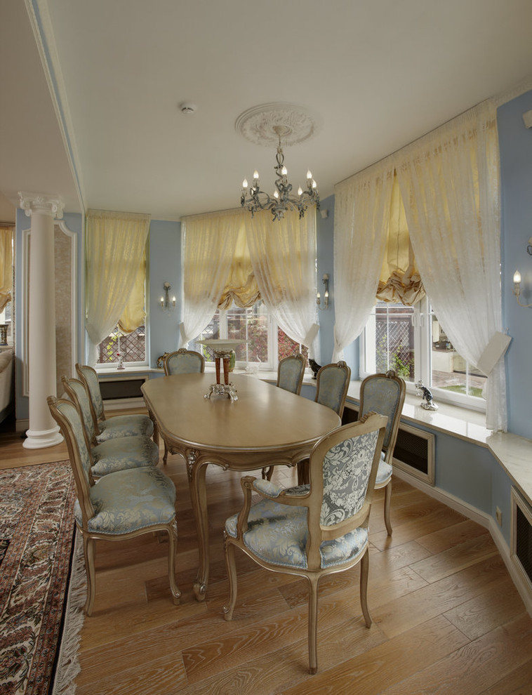Photo of a mid-sized transitional open plan dining in Moscow.