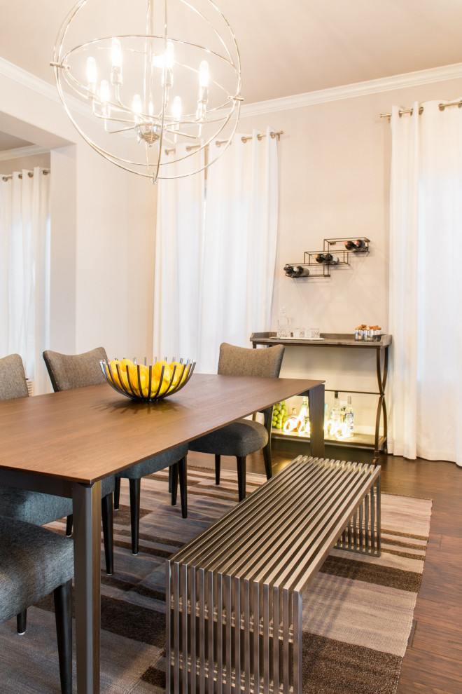 Inspiration for a mid-sized transitional medium tone wood floor kitchen/dining room combo remodel in Austin with beige walls and no fireplace