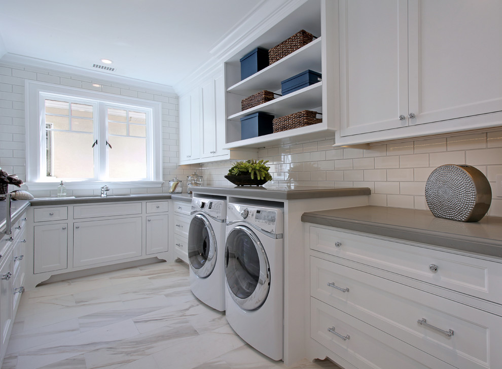 This is an example of a transitional laundry room in Orange County.
