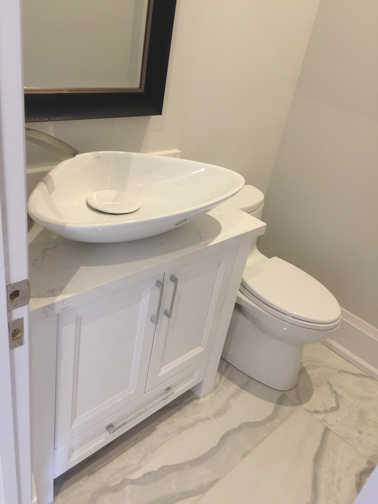 Example of a transitional kitchen design in Toronto