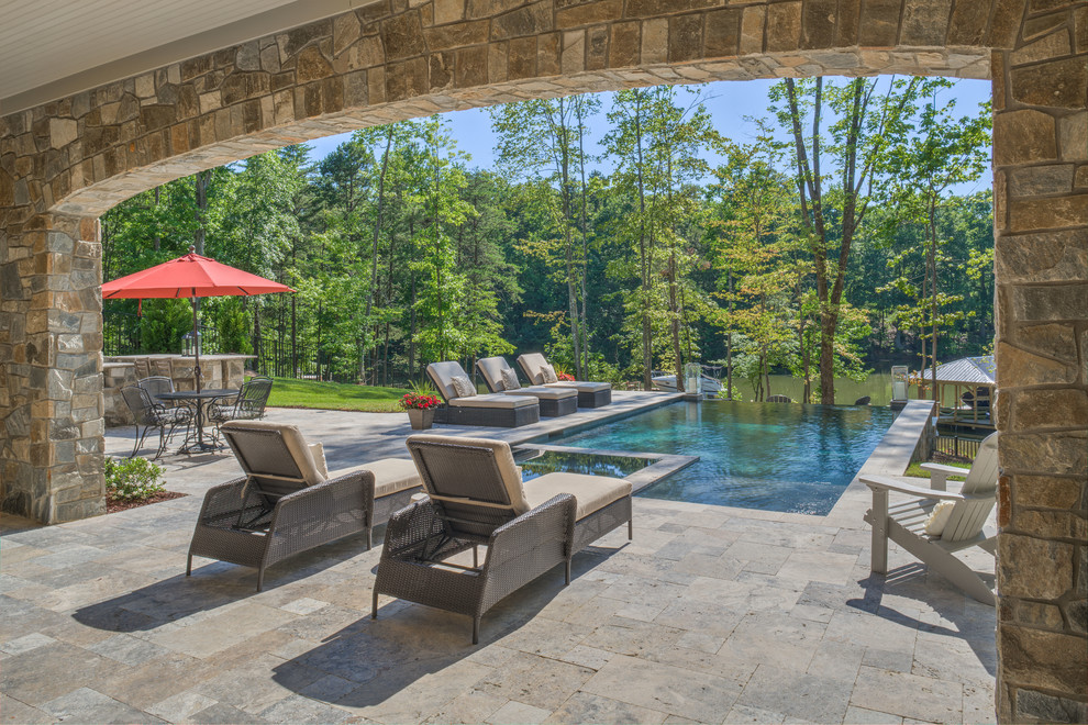 Example of a transitional home design design in Charlotte