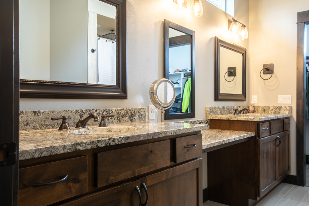 Inspiration for a mid-sized transitional medium tone wood floor and brown floor bathroom remodel with shaker cabinets and medium tone wood cabinets