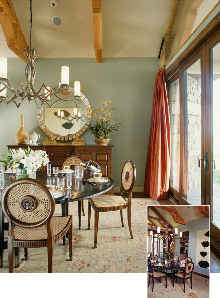 Example of a large transitional dark wood floor enclosed dining room design with green walls and no fireplace