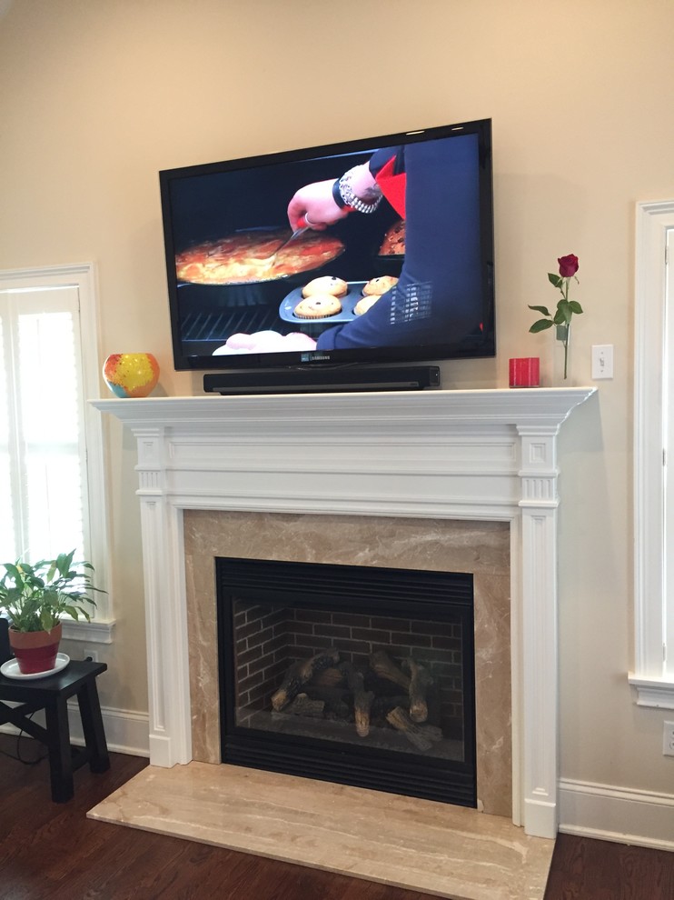 TV & SoundBar over Fireplace Contemporary New York by Square Peg