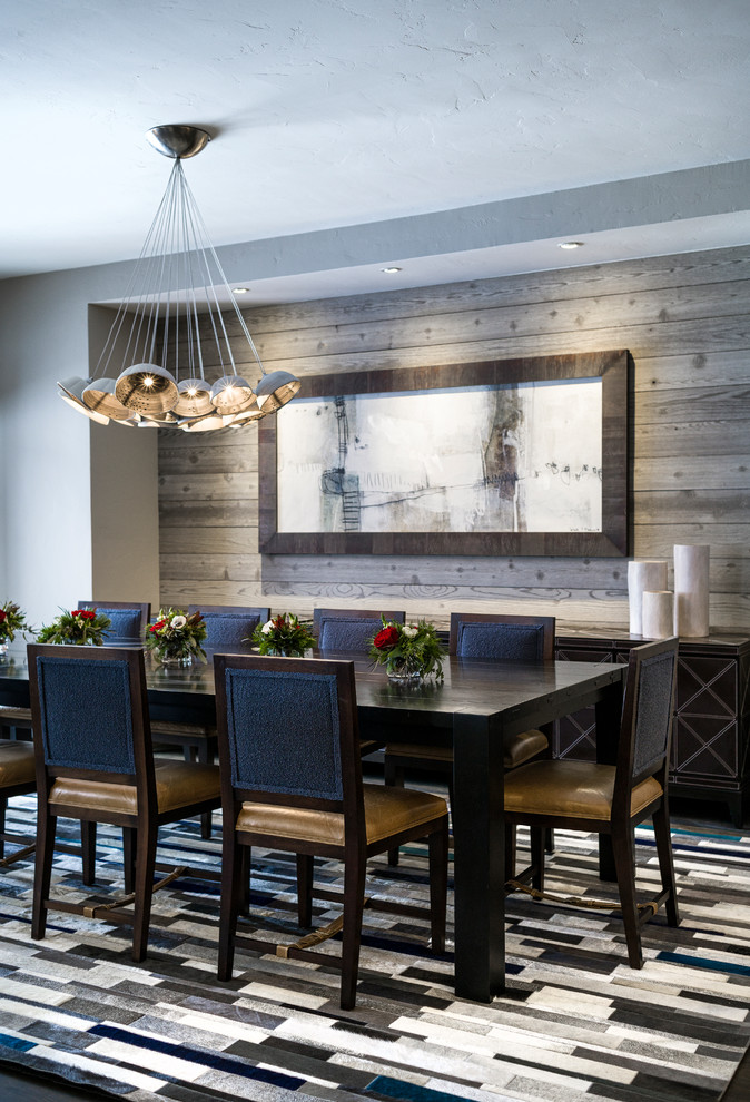 Inspiration for a transitional dining room in Denver with grey walls.