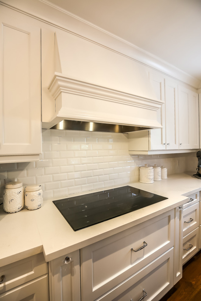 Example of a transitional kitchen design in Toronto
