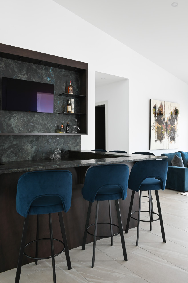 Design ideas for a medium sized contemporary u-shaped breakfast bar in Vancouver with flat-panel cabinets, dark wood cabinets, onyx worktops and turquoise worktops.