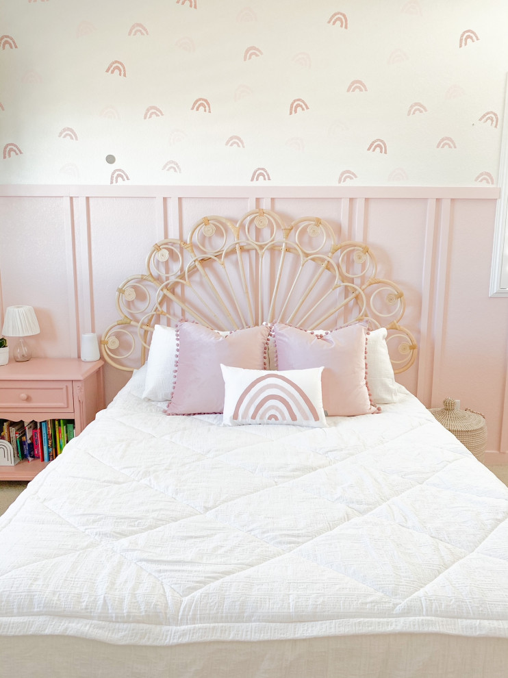 Farmhouse kids' bedroom for girls in Denver with pink walls and wainscoting.