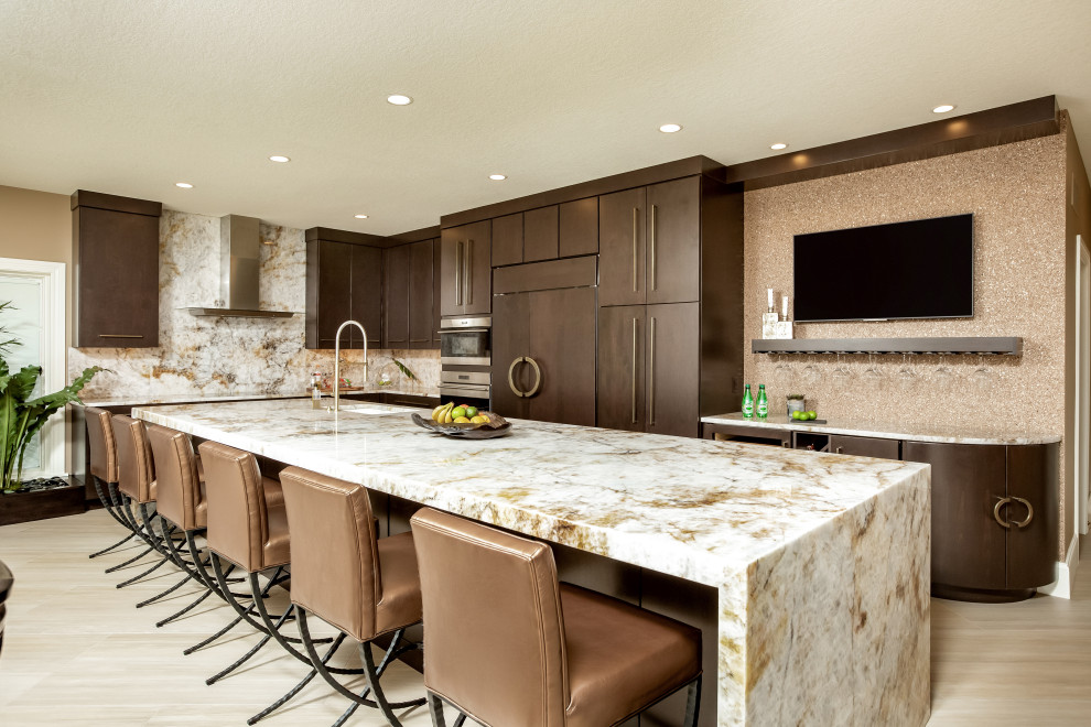 Example of a large transitional l-shaped beige floor eat-in kitchen design with an undermount sink, flat-panel cabinets, dark wood cabinets, marble countertops, multicolored backsplash, marble backsplash, paneled appliances, an island and multicolored countertops