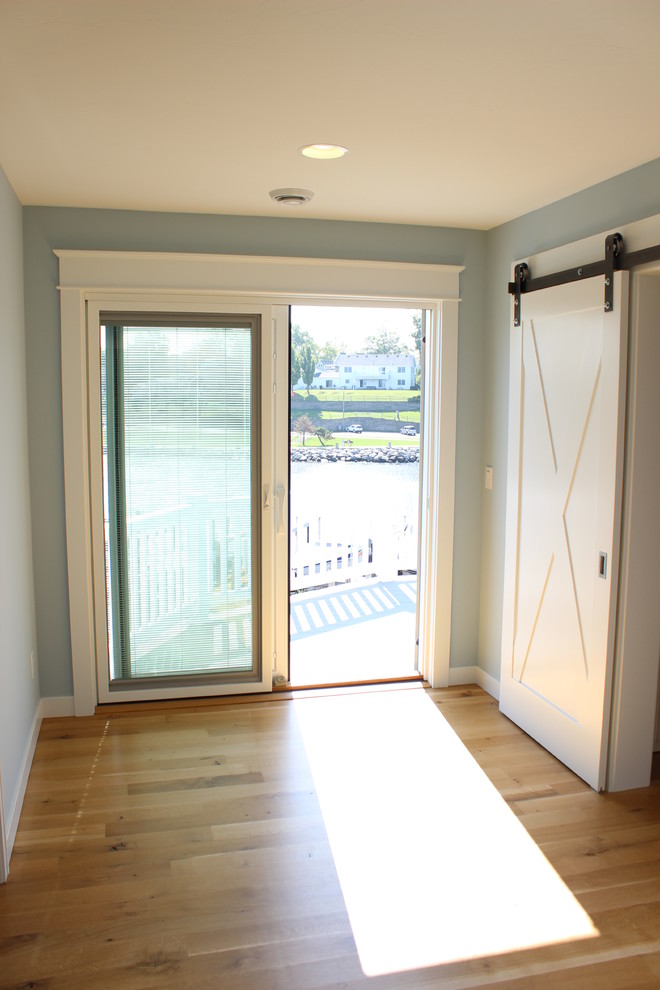 This is an example of a beach style hallway in Grand Rapids.