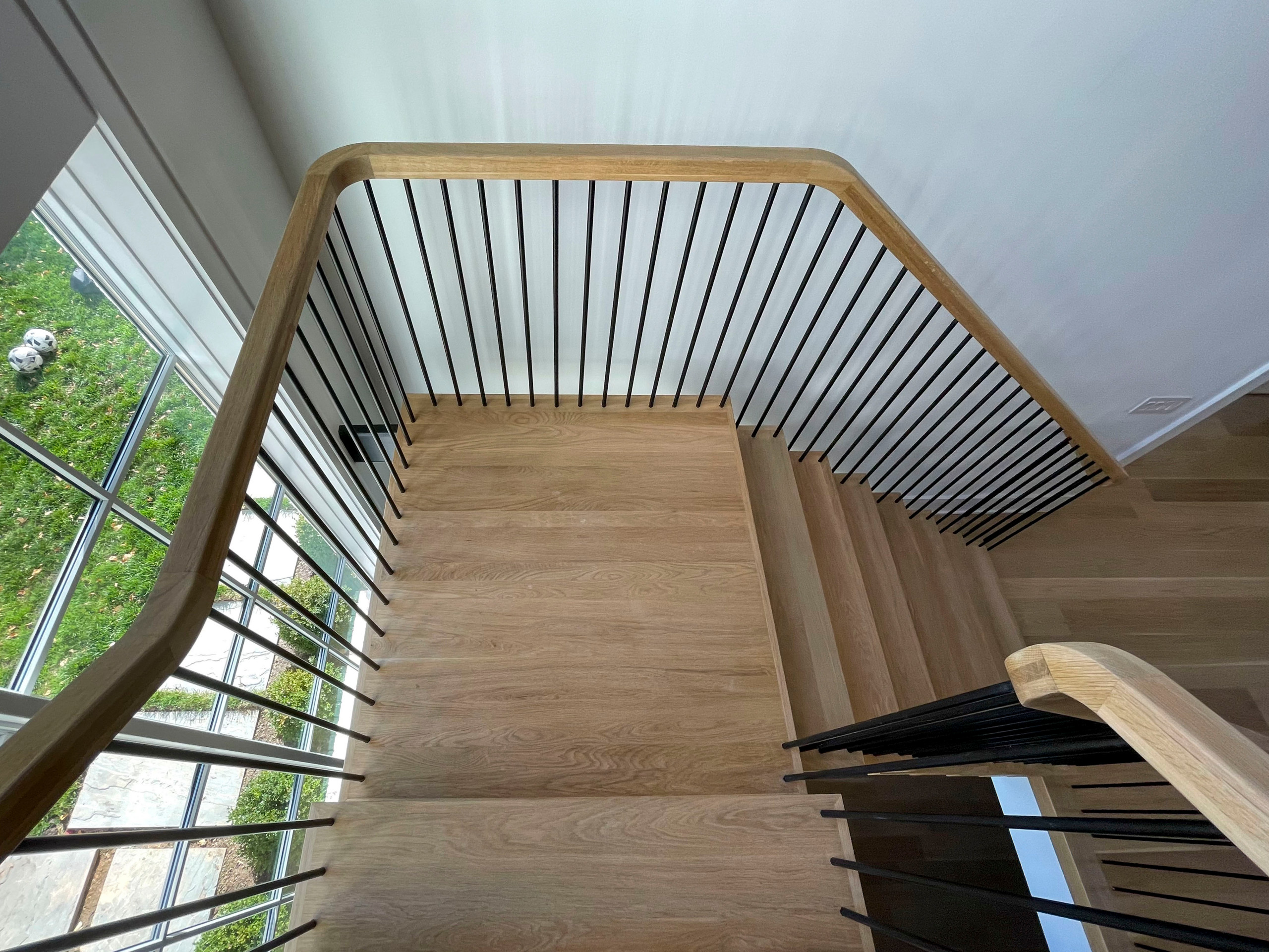 96_Dramatic cantilevered no-riser staircase, Bethesda, MD 20814