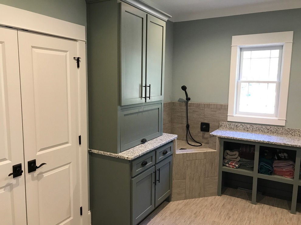 Inspiration for a mid-sized transitional l-shaped dedicated laundry room in Raleigh with shaker cabinets, grey cabinets, granite benchtops, grey walls, vinyl floors, a side-by-side washer and dryer and beige floor.