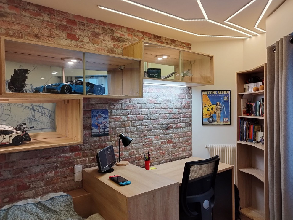 Источник вдохновения для домашнего уюта: кабинет в стиле лофт с кирпичными стенами