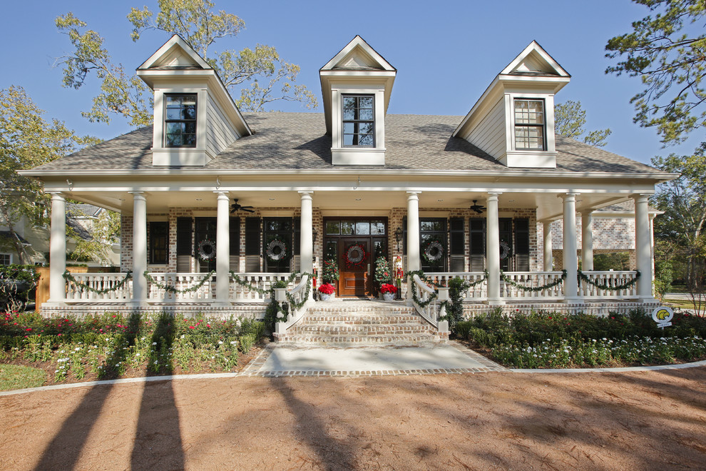 Inspiration for a traditional two-storey brick exterior in Houston.