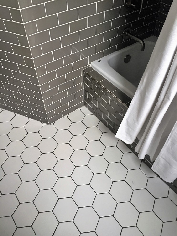 Inspiration for a contemporary bathroom in Calgary with subway tile and mosaic tile floors.