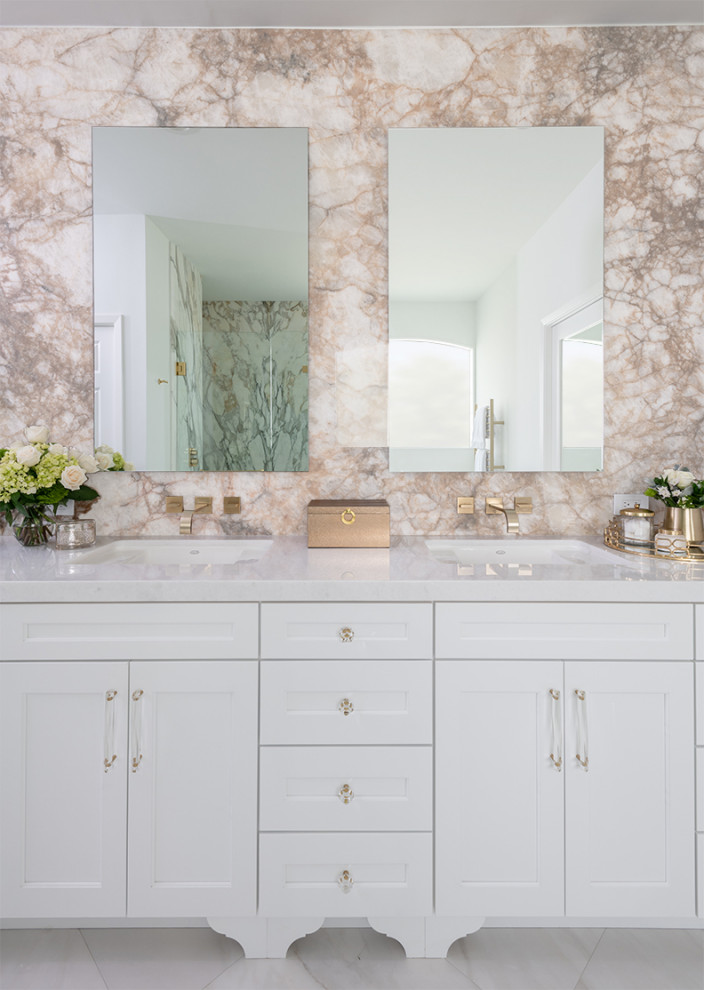 Photo of a classic bathroom in Dallas with white cabinets, a built-in bath, a built-in shower, a bidet, stone slabs, white walls, marble flooring, a submerged sink, quartz worktops, white floors, a hinged door, a shower bench, double sinks and a freestanding vanity unit.