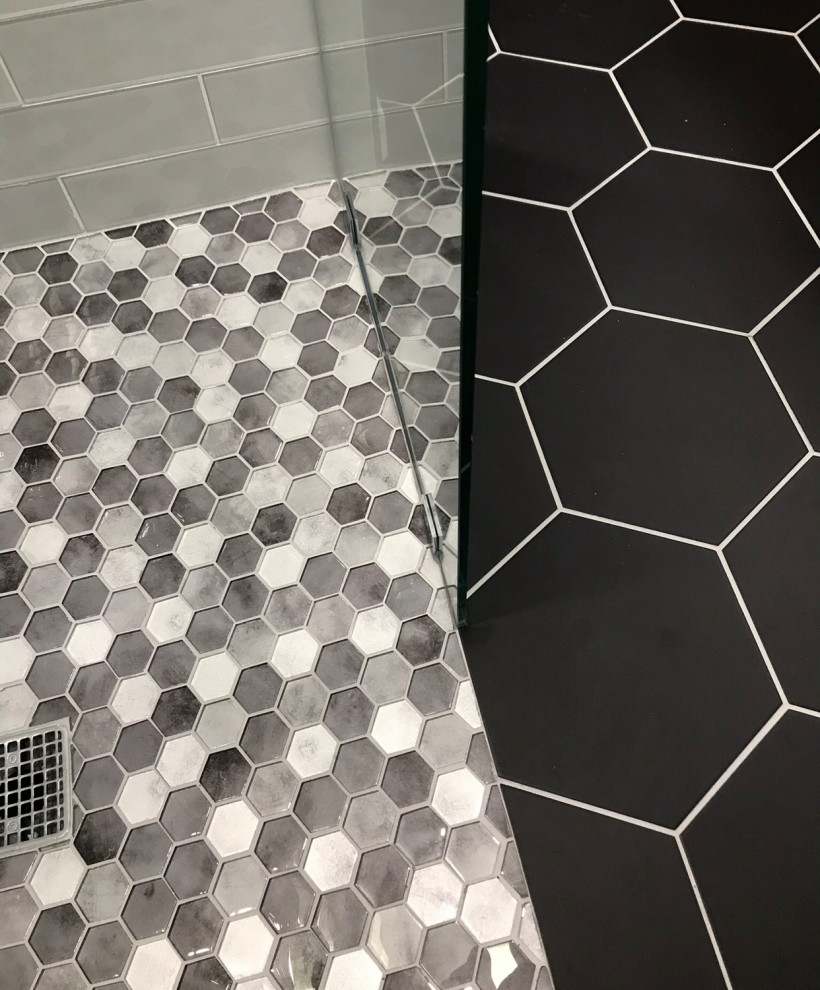 This is an example of a medium sized modern grey and black ensuite bathroom in Phoenix with black cabinets, black and white tiles, mosaic tiles, grey walls, a submerged sink, quartz worktops, grey worktops, feature lighting, a single sink, a freestanding vanity unit and a drop ceiling.