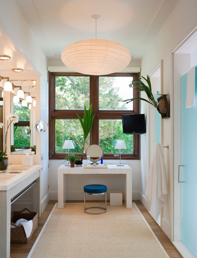 Photo of a beach style bathroom in New York with an undermount sink.