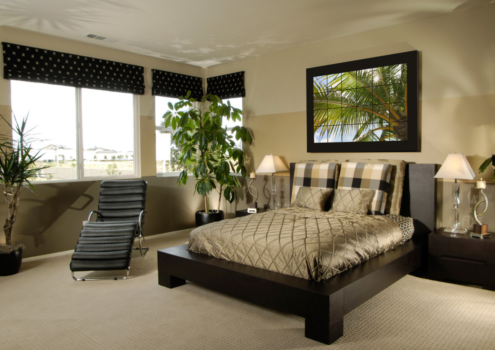 This is an example of a large tropical bedroom in Orlando.