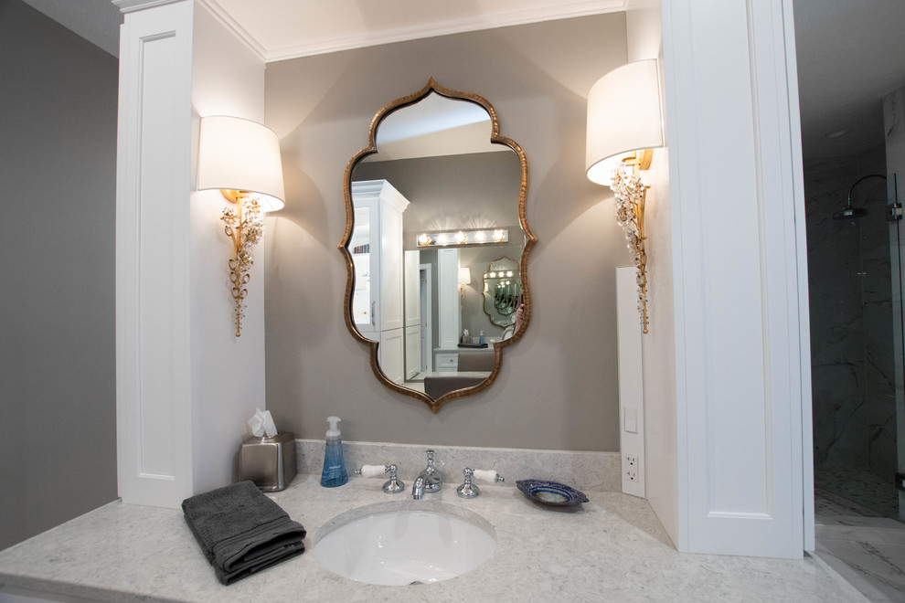 Inspiration for a traditional master wet room bathroom in Other with furniture-like cabinets, white cabinets, a claw-foot tub, grey walls, marble floors, an undermount sink, engineered quartz benchtops, white floor and a hinged shower door.