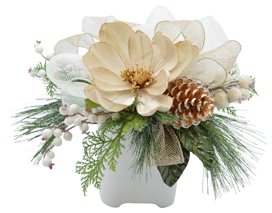 Magnolia and pine arrangement in ceramic container