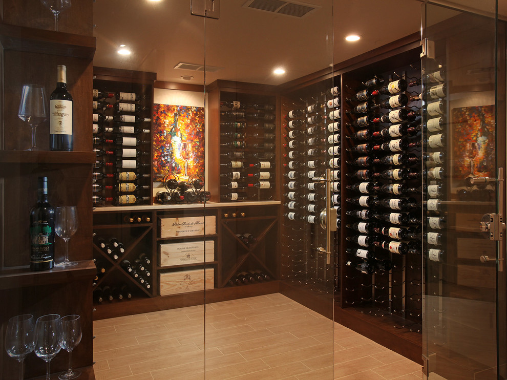 Expansive country wine cellar in Atlanta with ceramic floors, display racks and beige floor.