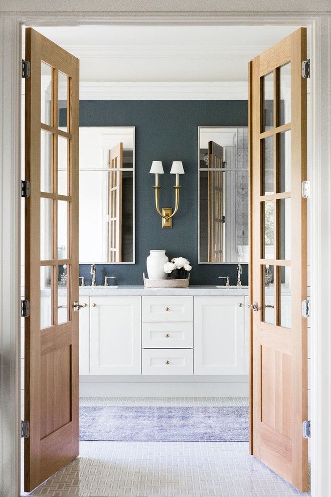 Large traditional master bathroom in Salt Lake City with shaker cabinets, white cabinets, a freestanding tub, white tile, blue walls, a drop-in sink, white floor and grey benchtops.