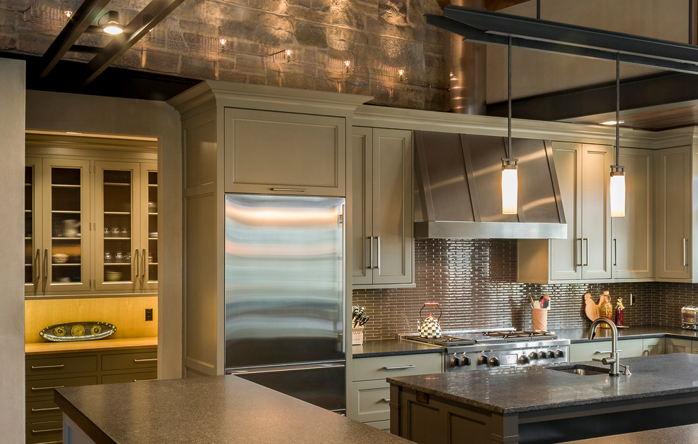Example of a large transitional l-shaped open concept kitchen design in Chicago with a single-bowl sink, flat-panel cabinets, gray cabinets, granite countertops, brown backsplash, ceramic backsplash, stainless steel appliances and an island
