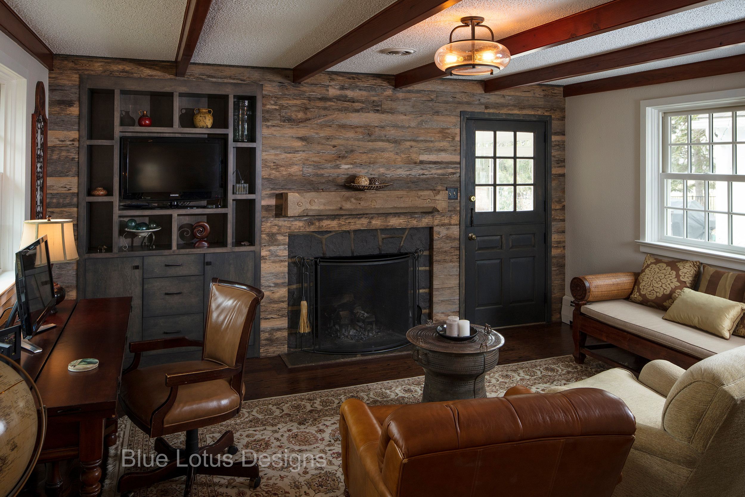 Rustic Family Room with Built-in and Fireplace