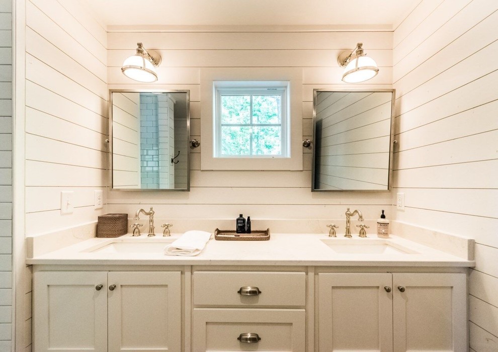 This is an example of a mid-sized country master bathroom in Atlanta with shaker cabinets, white cabinets, an alcove shower, white tile, subway tile, white walls, marble benchtops and an open shower.