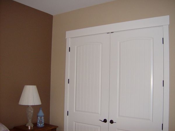 Inspiration for a mid-sized hallway remodel with beige walls