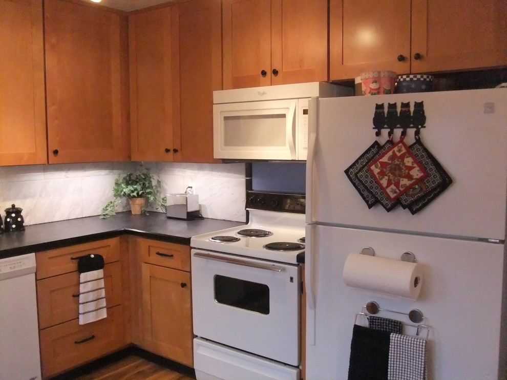 Example of a transitional kitchen design in Omaha